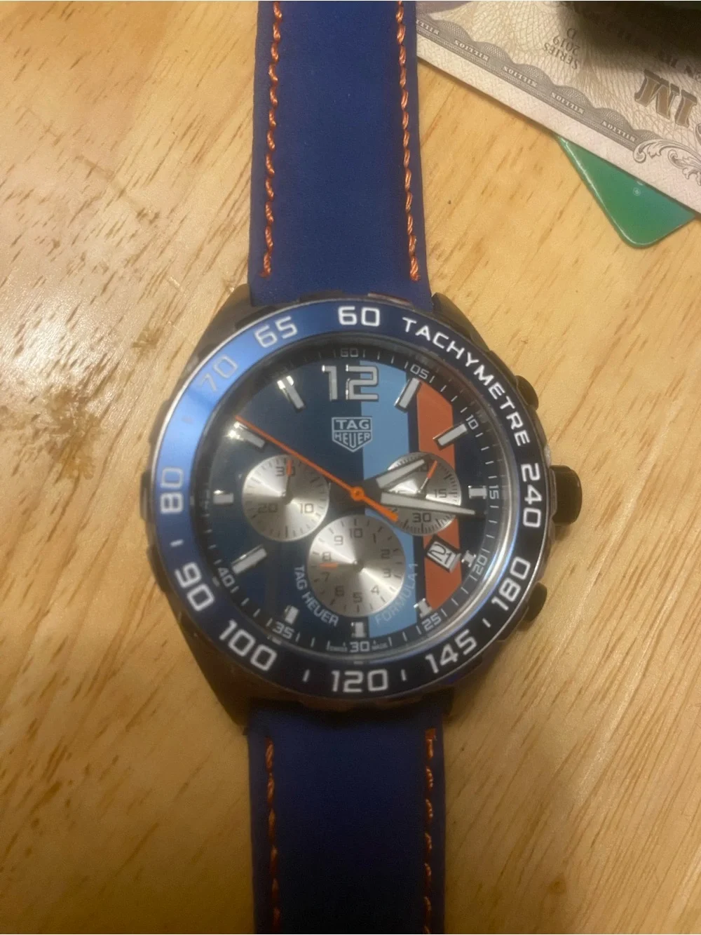 New Tag Heuer Blue Dial Watch with Orange Accents